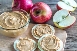 Apples with peanut butter or seed butter spread