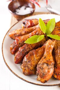 Chicken drumsticks on a Plate with high yield and juicy texture